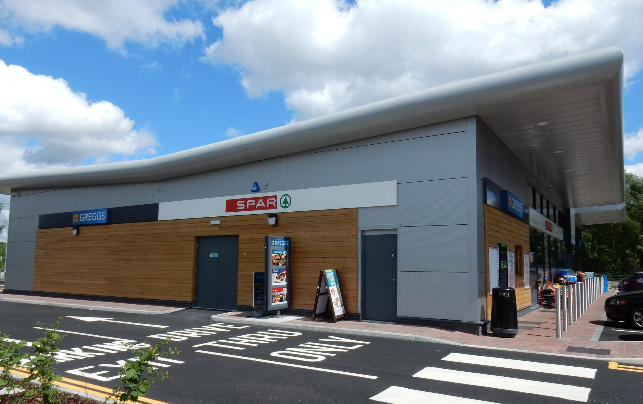 Side elevation and drive-thru route at Irlam Gateway Service Station